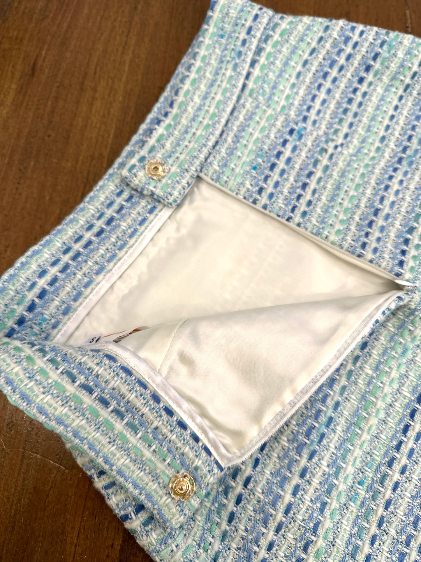 Tweed aquamarine skirt of wool hight quality
