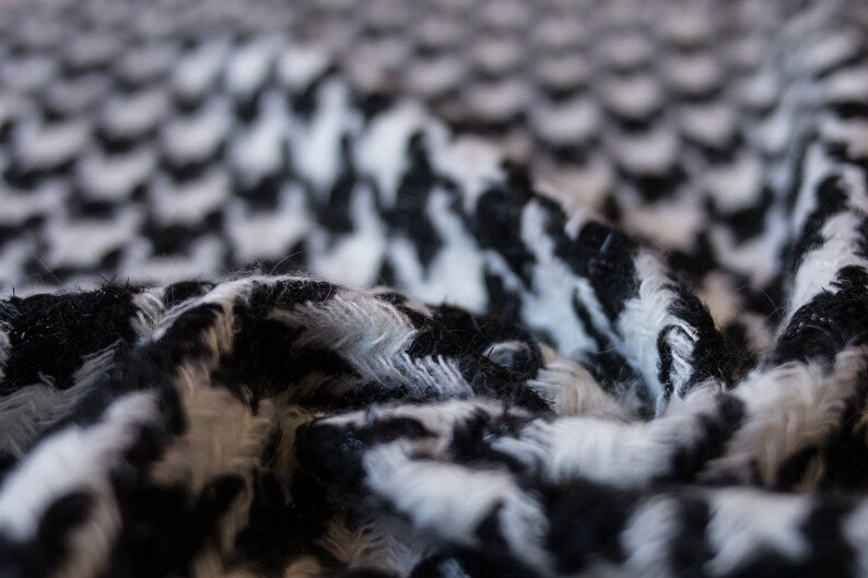 Mohair de lana blanco y negro de tweed